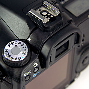mode dial, menu button and hot-shoe