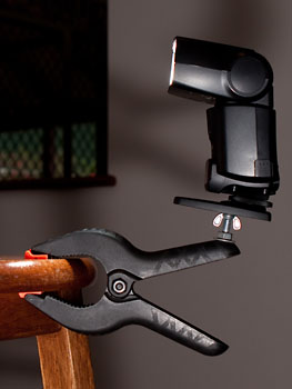 Canon 430EX mounted on a clamp