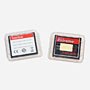 two full memory cards in their cases (front of memory cards facing TOWARDS from the label)