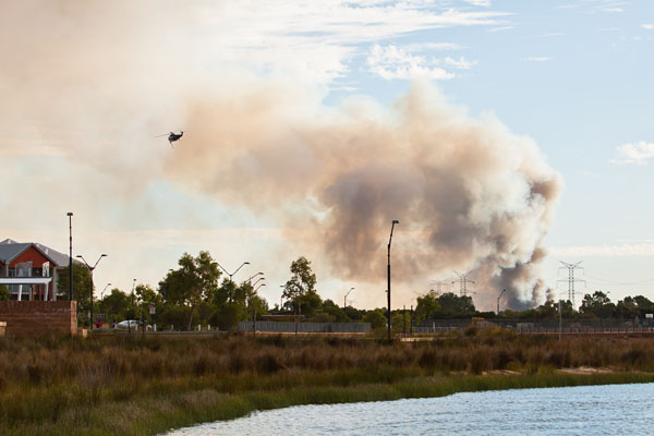 helicopter heading back to the blaze